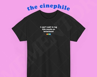 May include: Black t-shirt with the text "I can't wait to log this movie on Letterboxd" and a small logo of three colored circles.