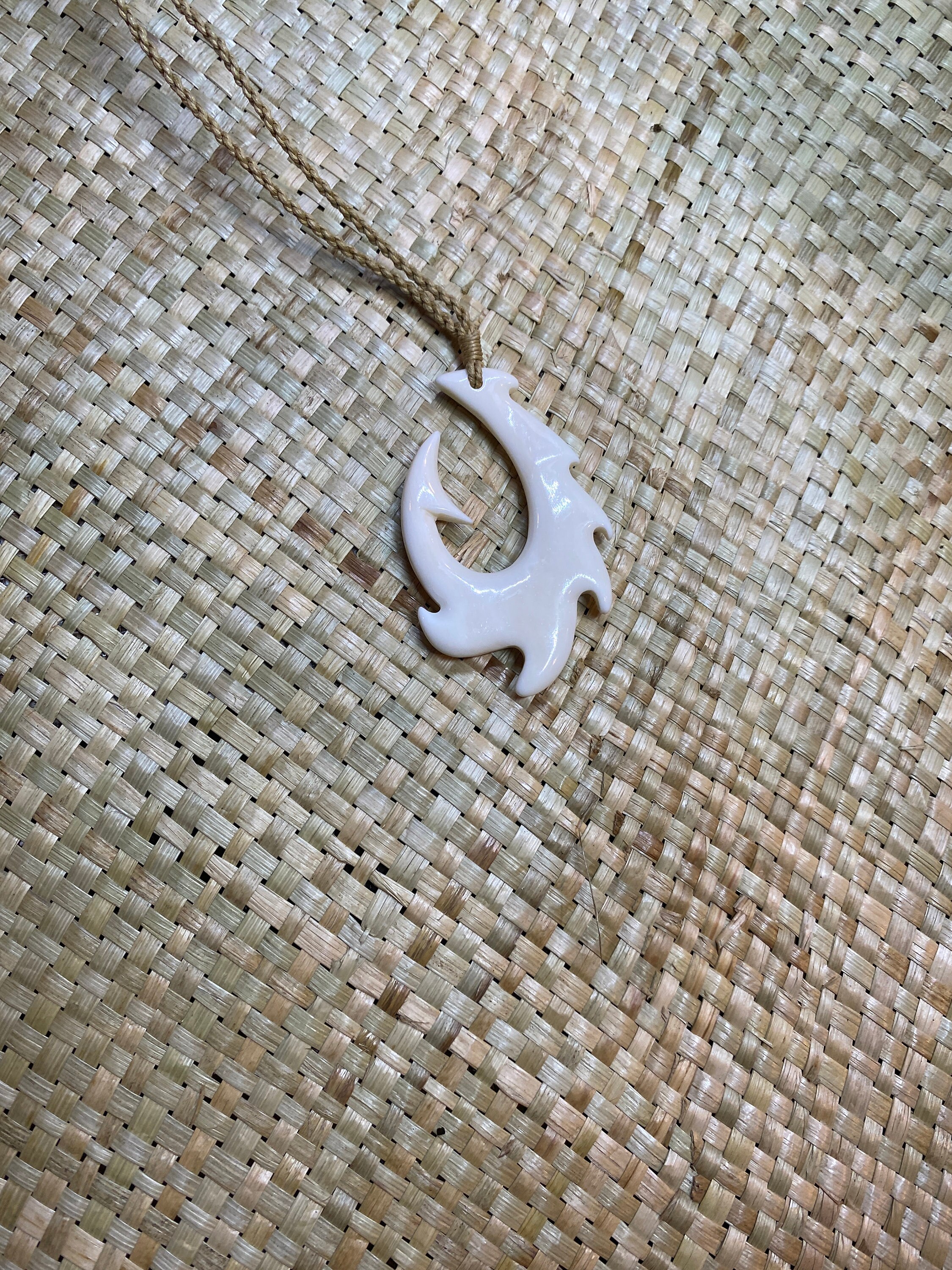 Bone fish hook w/wave design and shark tail hook tip Etsy