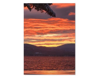 Tarjeta de felicitación de Nochebuena con puesta de sol en el lago Winnipesaukee