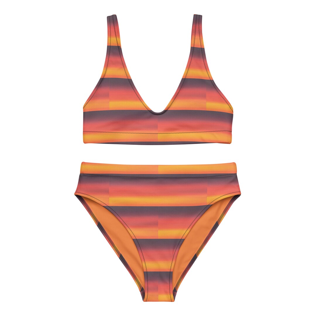 Orange and yellow recycled women’s high-waisted bikini set.