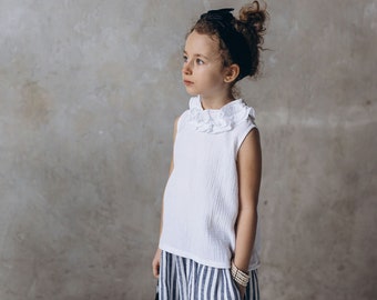 Witte blouse voor meisjes, Feestelijke mousseline blouese met rucheskraag, Meisjesvakantieblouse zonder mouwen, Zomertopcadeau voor meisjes