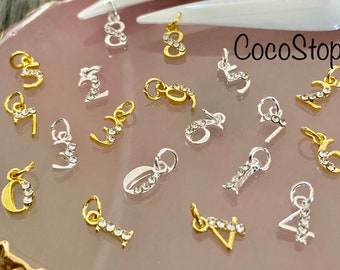 Conjunto de números colgantes 3D nail charms nail art