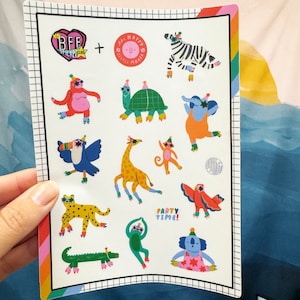 May include: A sheet of colorful stickers featuring various animals, including a zebra, a toucan, a giraffe, a turtle, and a monkey. The stickers are designed with a playful and whimsical style, perfect for adding a touch of personality to journals, laptops, or water bottles. The stickers also feature the text "BFF Stickers" and "Party Time!"