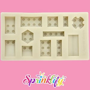 May include: A beige silicone mould with various shapes, including rectangles, squares, and a hexagon, each featuring circular indentations. The mould is designed for creating decorative elements. The Sprinklify logo is at the bottom.