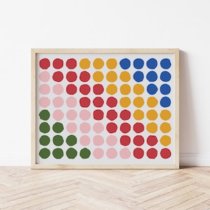 May include: A framed print with a geometric pattern of colorful circles in shades of pink, red, green, yellow, and blue.