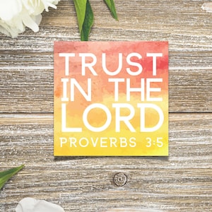May include: A watercolor-style card with the text "TRUST IN THE LORD PROVERBS 3:5" on a yellow, orange, and red background.