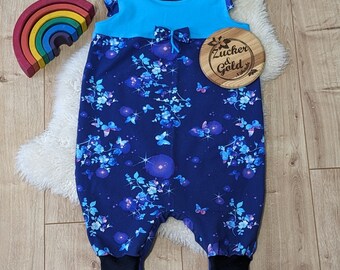 Pelele niña piezas únicas únicas con abertura cruzada en color azul con mariposas