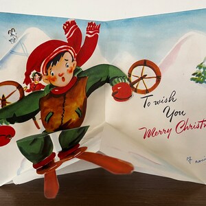 biglietto d'auguri pop-up vintage di Natale sci sci