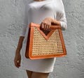 Handmade Rattan and Leather Top Handle Bag: Unique Shape Women Clutch product logo