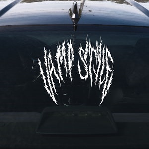 May include: White vinyl sticker with the words "VAMPIRE STATE" in a gothic font with sharp edges.