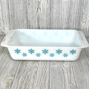 May include: White rectangular baking dish with a blue snowflake pattern.