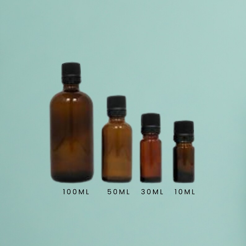 May include: Four amber glass bottles with black lids, lined up from largest to smallest. The bottles are labelled 100ml, 50ml, 30ml, and 10ml.