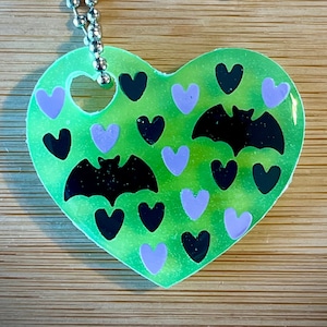 Glow bats heart keychain.