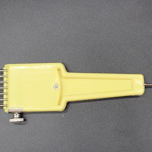 Brand (Brother and Toyota) and generic universal 4.5 and 9mm Transfer Tool for knitting machines. Can be adjusted for 1-7 pegs.