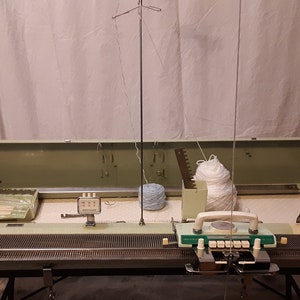 Brother KH551 Knitting machine with four-push button patterning mechanism, fully cleaned and tested