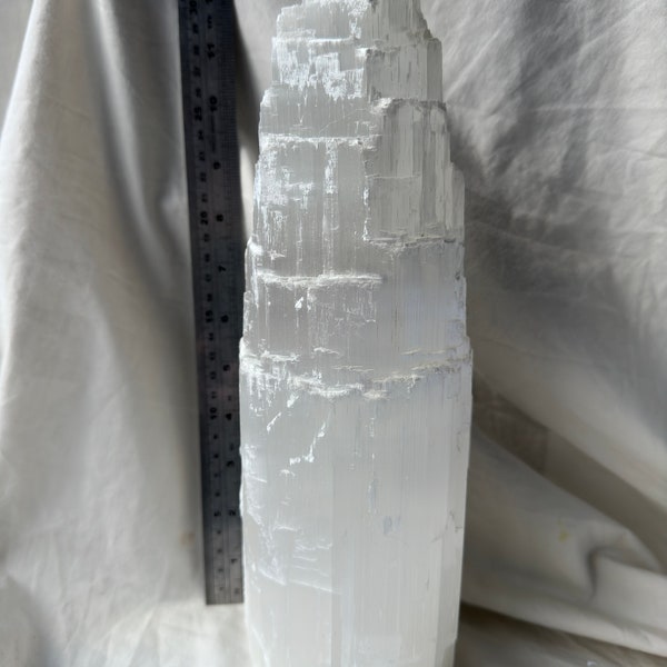 Selenite crystal lamp on light base