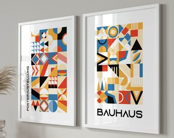 May include: Two framed prints with geometric designs in red, yellow, blue, and black. The print on the right has the word "BAUHHAUS" in black text.