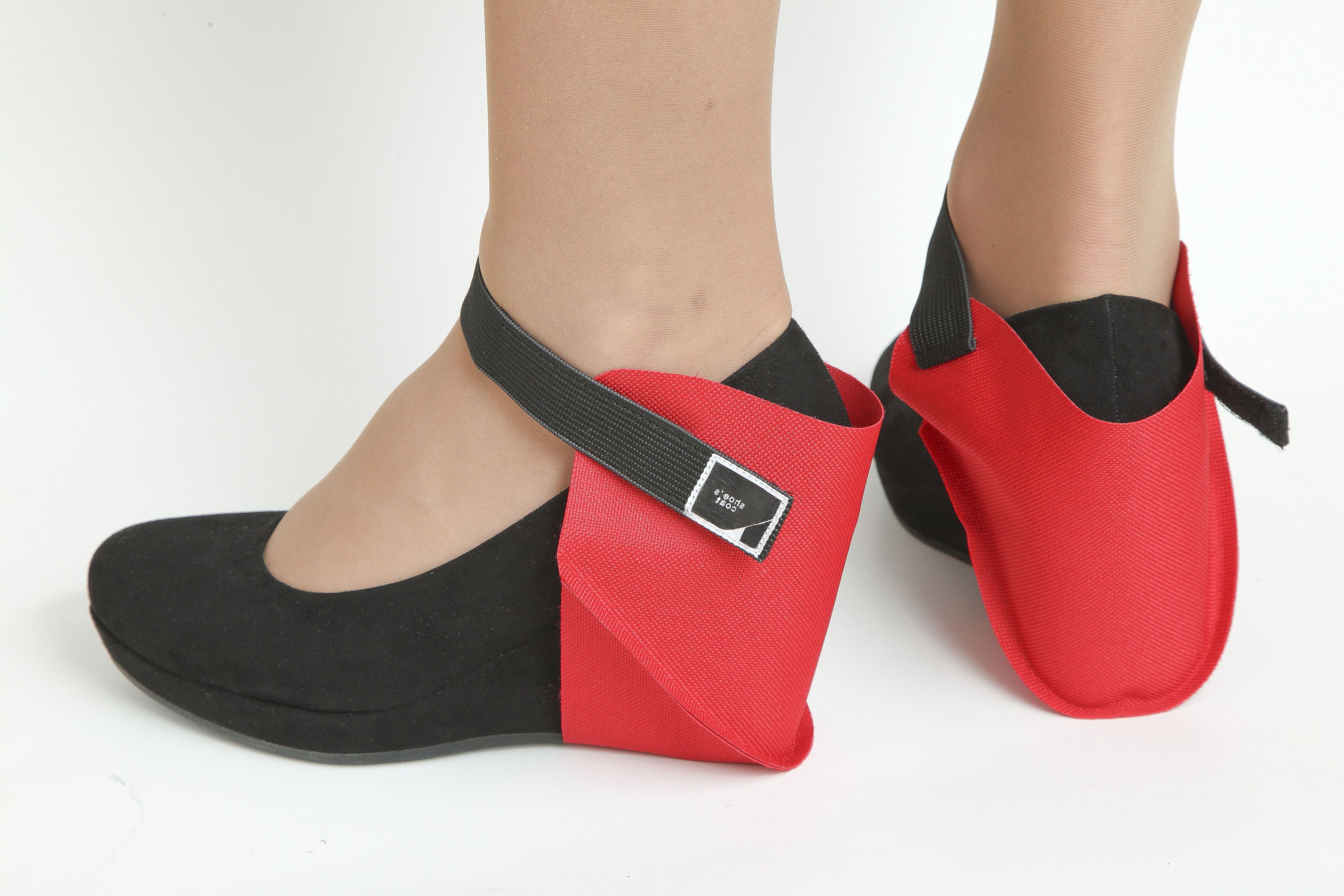 Shoe heel clearance protectors for driving