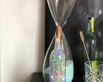 Vibrant “Marbles & Light” wine bottle decor.(Radical Rainbow Light edition)