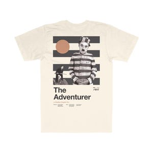 The Adventurer T-Shirt – Midcentury Kultfilm Design – Bio Baumwolle T-Shirt für Cinephiles – Minimalistisches Film-inspiriertes Art Shirt