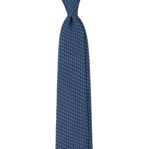 May include: A blue tie with a repeating geometric pattern. The tie is a solid color with a pattern of small, light blue shapes. The tie is knotted at the top and hangs vertically.