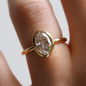 1.50 CT Oval Cut Bezel Set Moissanite Engagement Ring, Bezel Set Solitaire Ring, Solid Yellow Gold Wedding Ring, Promise Ring, Ring For Her
