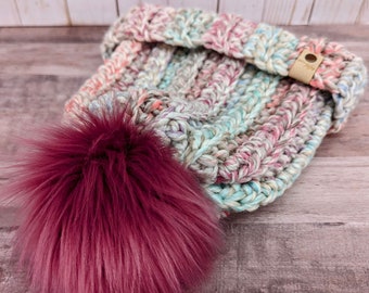 Dikke wintermuts met handgemaakte pompon