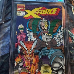 May include: A graded comic book of X-Force #1 from Marvel Comics, featuring a vibrant illustration of several characters. The cover art includes the title "X-FORCE" in yellow and red, with a $1.50 price tag.