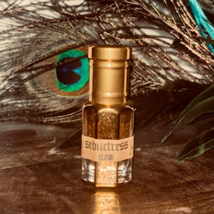 Seductress Elixir Oil | persuades any situation to go in your favor, hypnotic presence, irresistible aura, leave lingering impression