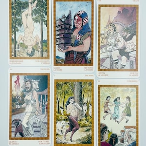 May include: A set of tarot cards with colorful illustrations depicting scenes from the major arcana. The cards are arranged in a grid with the card names and numbers visible. The cards are in a gold frame with a white background.