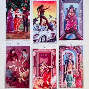 May include: Tarot card deck with colorful illustrations of the Major Arcana cards. The cards feature a variety of characters and symbols, including lovers, chariots, emperors, and empresses. The cards are numbered from I to XXI.