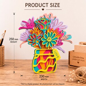 May include: A multi-layered wooden floral arrangement in a vase with the word LOVE on a tag. The piece features pink, yellow, teal, and purple flowers. Dimensions are 250 mm in height and 230 mm in width as indicated by the measurement lines.