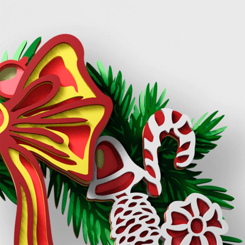 May include: A layered holiday decoration featuring a large red and yellow bow, a white and red candy cane, a white bell, a pinecone, and a flower-shaped ornament nestled among green pine needles, all rendered in a dimensional, stacked paper style.