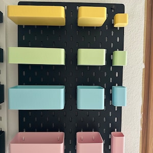 Storage boxes suitable for Ikea Skadis in various pastel colors and sizes - organization for your shelving system