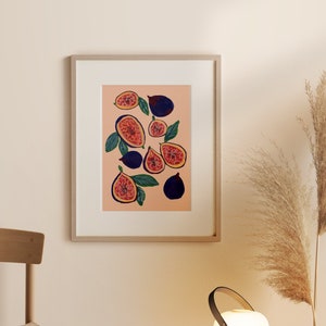 May include: A framed print of a painting featuring a cluster of figs in shades of purple, red, and green on a peach background.