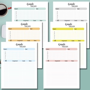 May include: A selection of grade tracker sheets in pastel colours. Each sheet includes sections for subject, goal, assignment, grade, and notes. The sheets are designed for tracking academic progress.