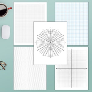 May include: Assortment of graph paper sheets with different grid patterns, including isometric, polar, and standard grids. A cup of coffee, a computer mouse, and eyeglasses are on the light blue surface.