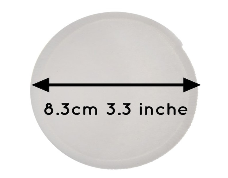 K&ouml;nnte beinhalten: Wei&szlig;e runde Scheibe mit einem schwarzen Pfeil, der nach links und rechts zeigt, mit dem Text "8.3cm 3.3 Zoll" unter den Pfeilen.