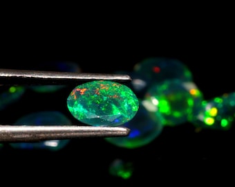 Faceted Ethiopian Opal Gemstone: Oval Multi Fire Opal (4x6 mm)