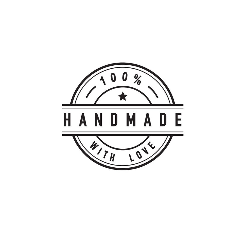 May include: Black and white circular stamp with the text "100% Handmade with Love" and a star in the center.