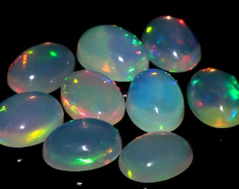 AAA Ethiopische opaalcabochon: meerkleurige ovale edelsteen, 6 x 8 mm