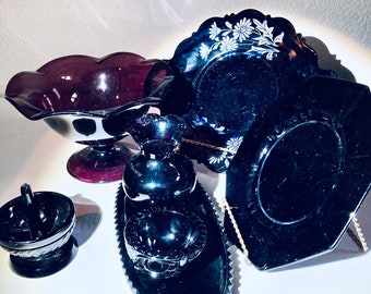 Black amethyst collectable glass in antique to Vintage candy dish vase platter etc.