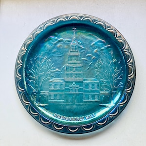 Vintage Carnival glass iridescent blue plate with independence Hall.