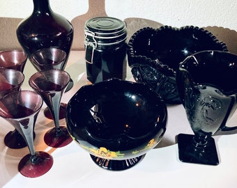 Black amethyst art glass goblet vases bowls canister decanter with drinking flutes etc in antique to Vintage.