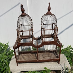 Large Authentic Antique Victorian two tiered bird cage with two doors & bottom tray.