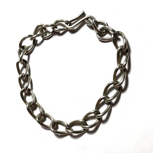 Antique Art Deco sturdy (850) silver link bracelet hallmarked.