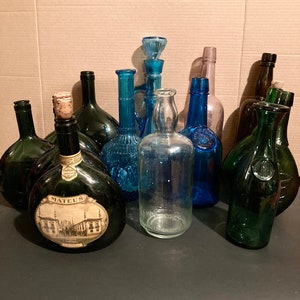 Antique to Vintage magnesium green aquamarine clear brown bottles.