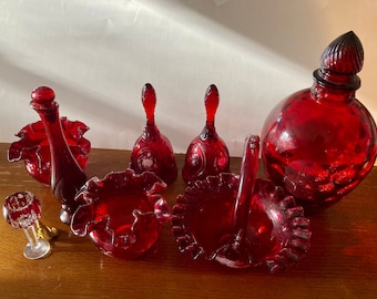 Fenton ruby red art glass hand painted & artist signed decanter, ruffled basket, ruffled bowls, bells etc. Selling per piece.