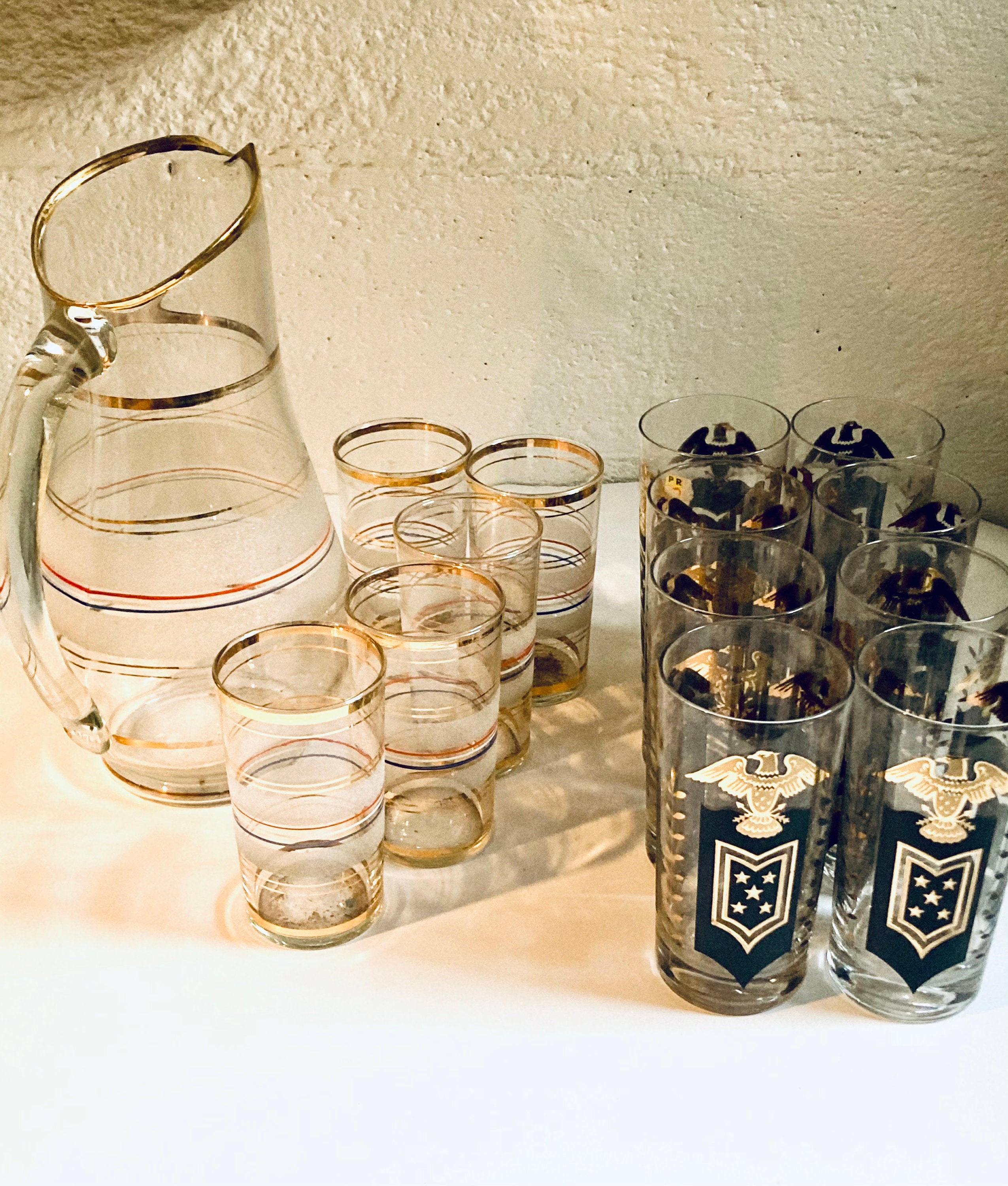 Vintage pitcher & matching drinking glass set and eagle drinking barware glasses.