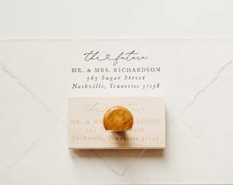 May include: A wooden return address stamp with the text "the future" and "MR. & MRS. RICHARDSON 565 Sugar Street Nashville, Tennessee 37138" in black ink.